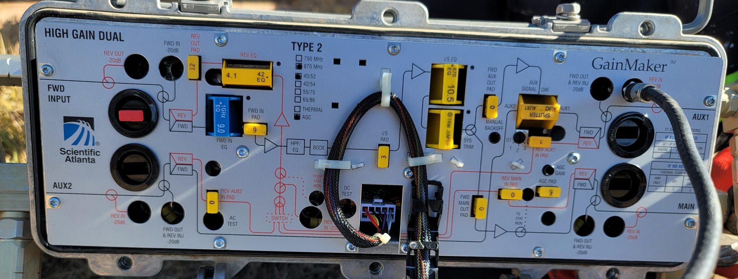 Open amplifier housing with the module board, pads and equalizers visible